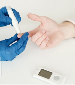 A lady's hand to be tested for blood sugar